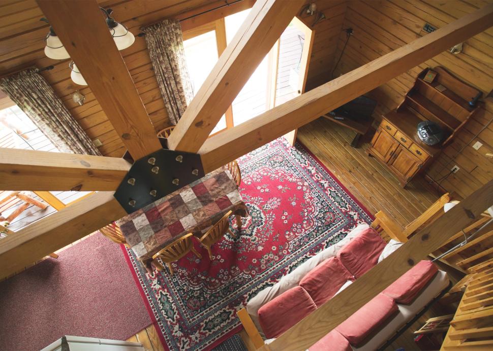 Photo from the loft looking down to the living room in the Hemlock cottage