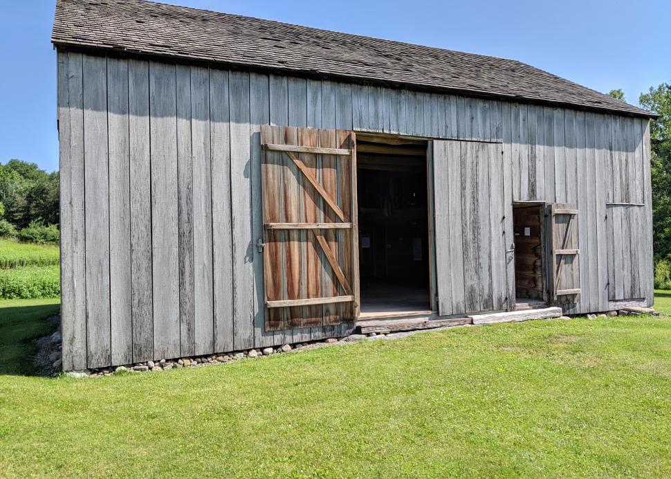 Photo of a barn at the welcome center for Hiram Edson Farm