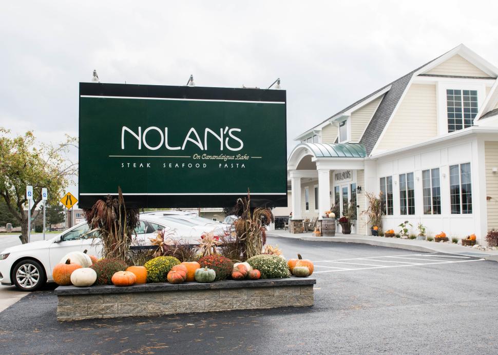 The exterior sign for Nolan's in Canandaigua