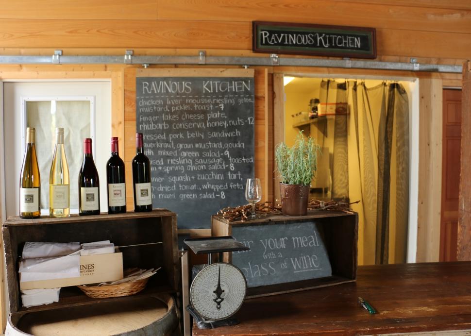 Items sit on shelves for sale inside of The Ravenous Kitchen in Geneva