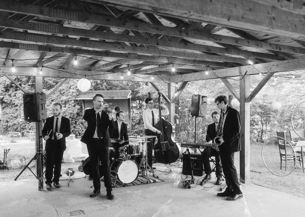 The wedding band plays under a pavilion at the Cummings Nature Center