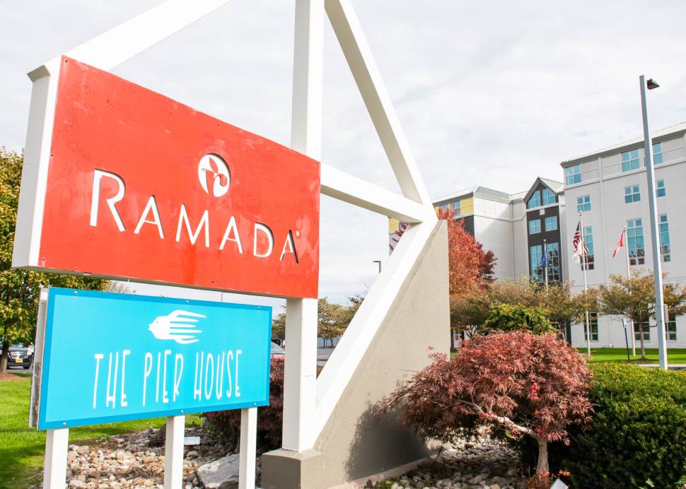 Exterior sign for The Ramada Geneva Lakefront Hotel