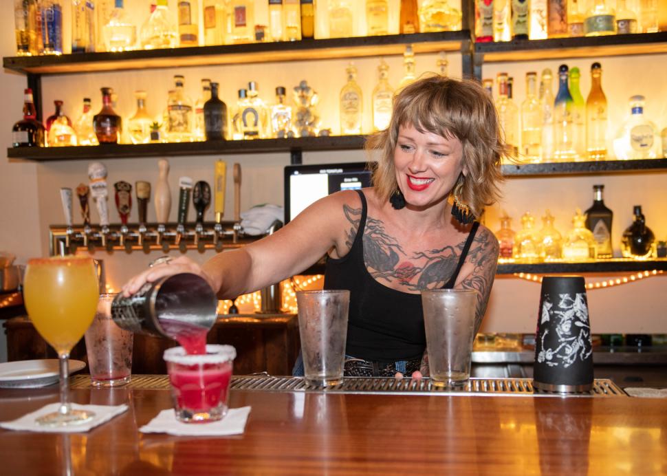 A bartender pours drinks at Rio Tomatlan in Canandaigua