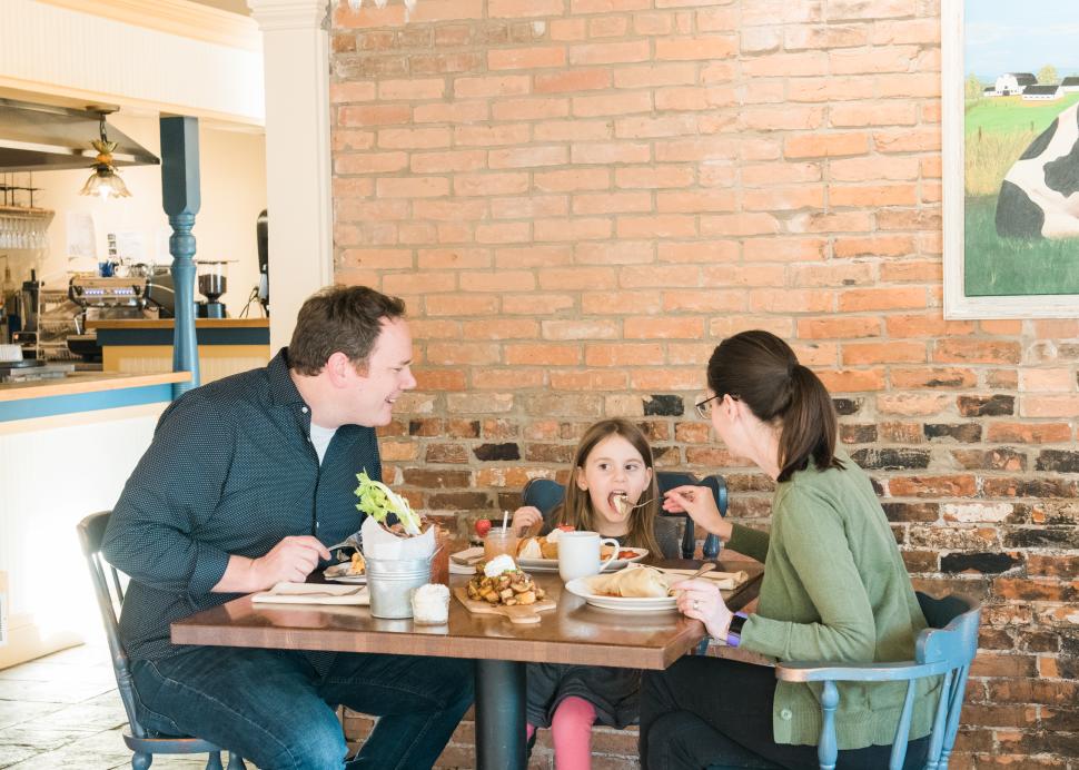 A family enjoys a meal at Simply Crepes in Canandaigua
