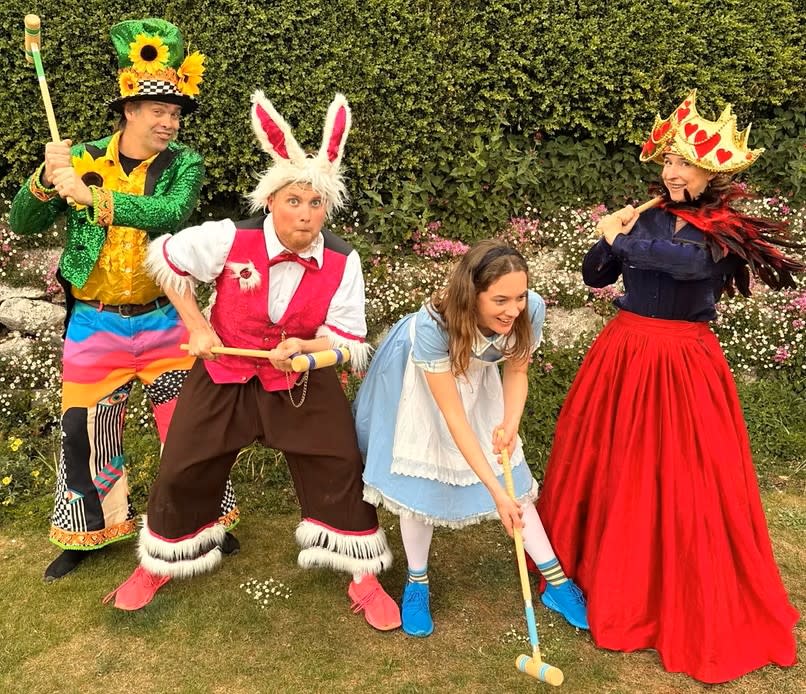 Actors dressed as characters in Alice in Wonderland