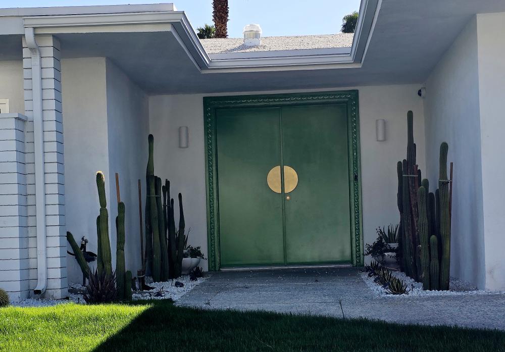 Green colored door at 2387 Alhambra Drive