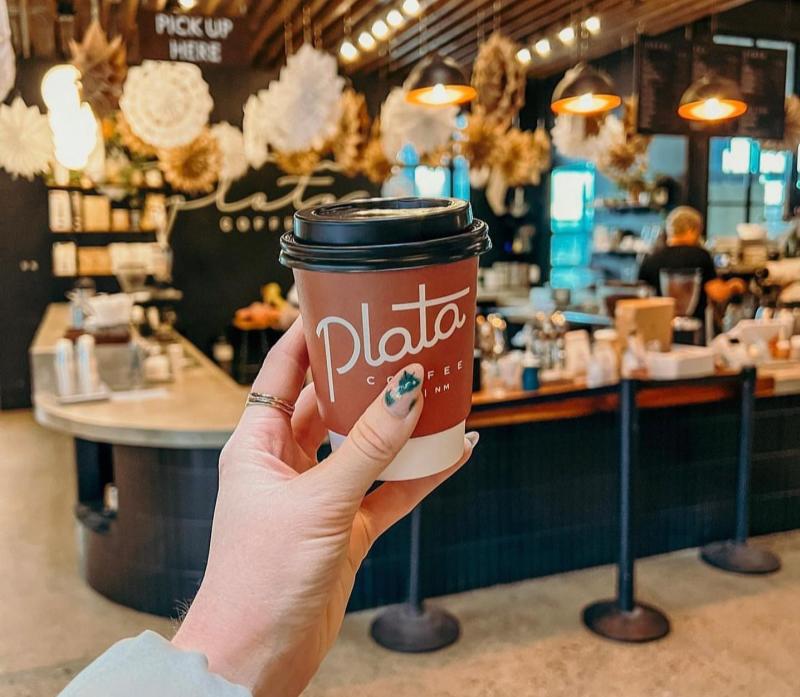 A picture of a coffee in front of Plata Coffee in Sawmill Market