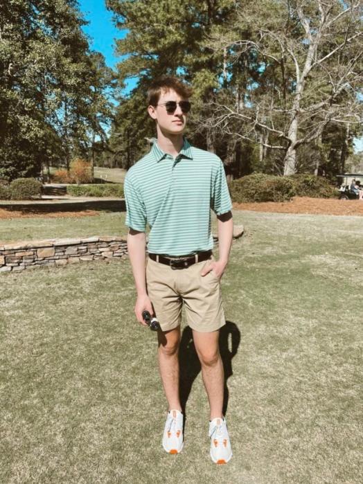 man in golf shirt and shorts from Escape Outdoors