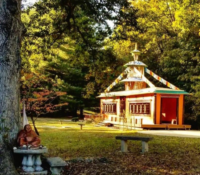 A buddha and cultural building at the TMBCC