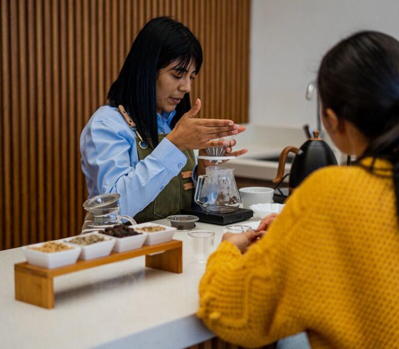 barista-explaining-the-process-coffee-filtering-hacienda-haras-cerro-punta-tierras-altas