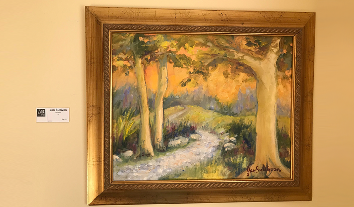 Jan Sullivan painting at Art Barn