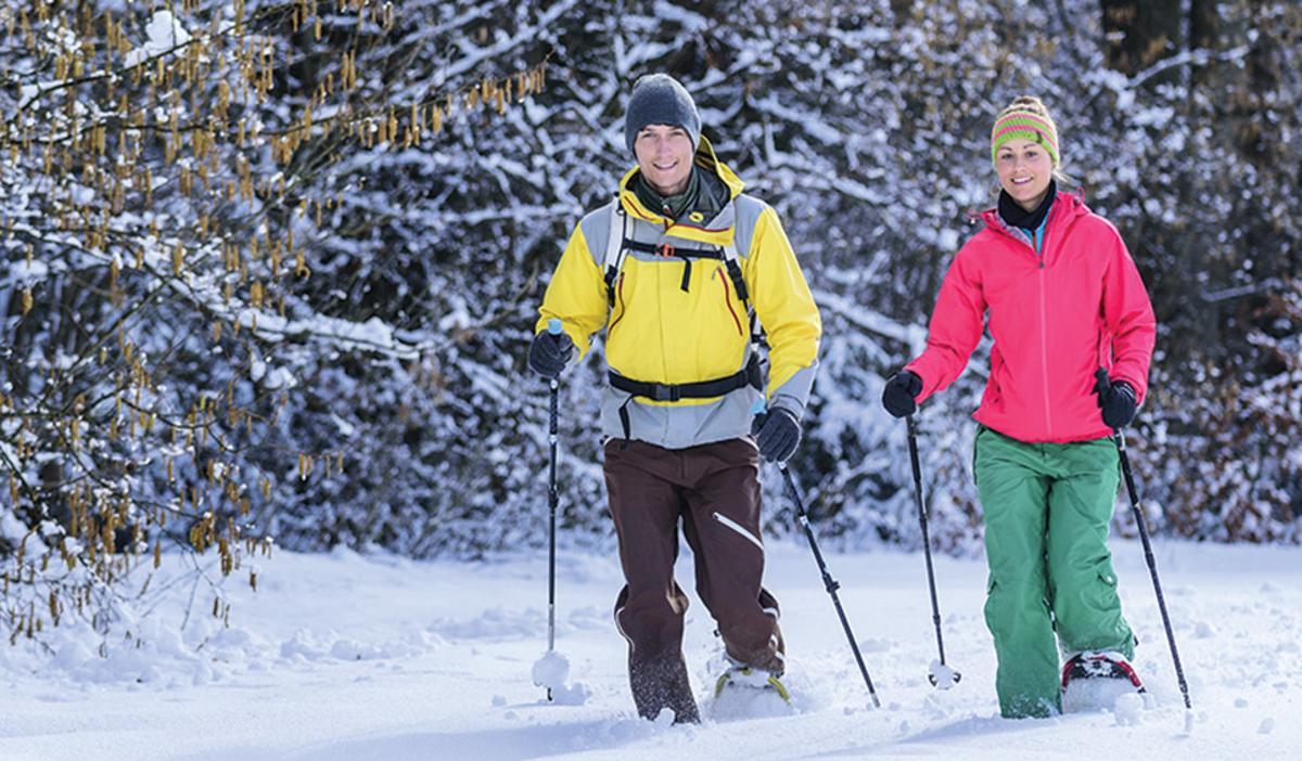 Couple snowshoeing