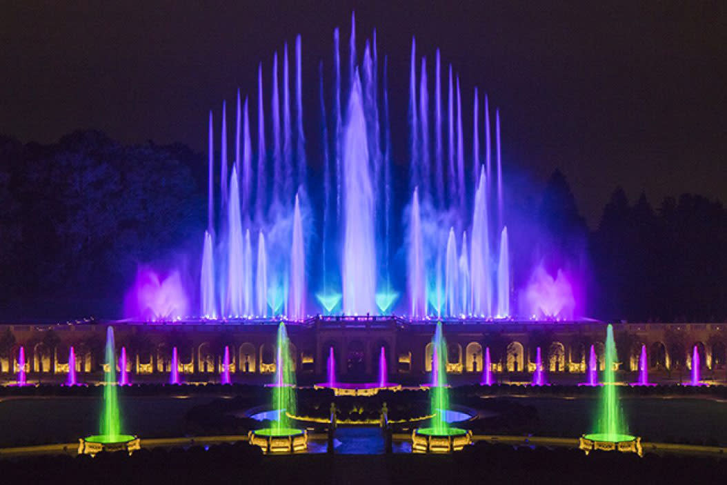 Water fountain glowing with colorful lights at Festival of Fountains