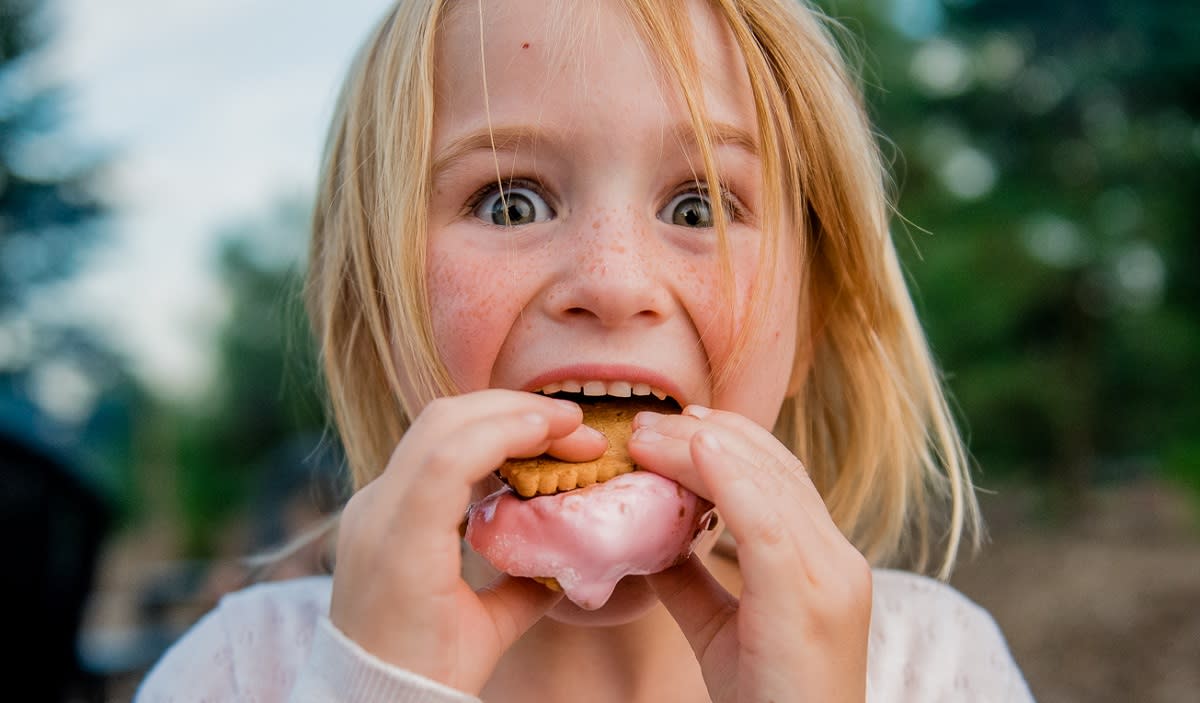 Snyders Family Farm Child Eating Marshmallow