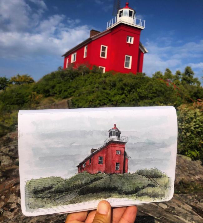 A beautiful sketch by Mike Shisler of the iconic red Marquette Harbor Lighthouse in Marquette, MI