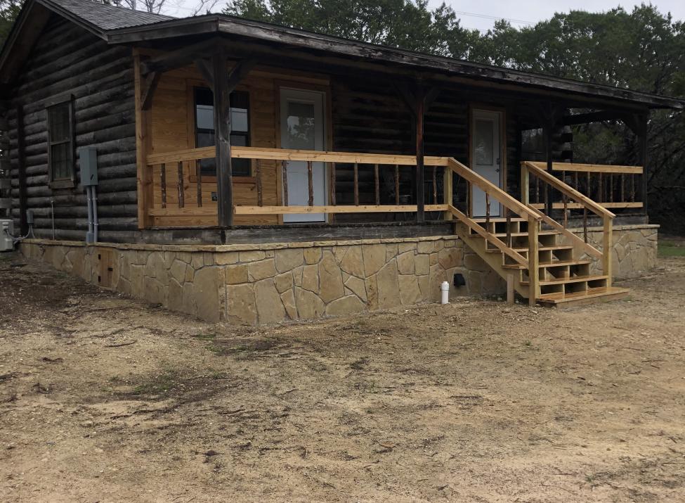 Front of cabin with covered porch