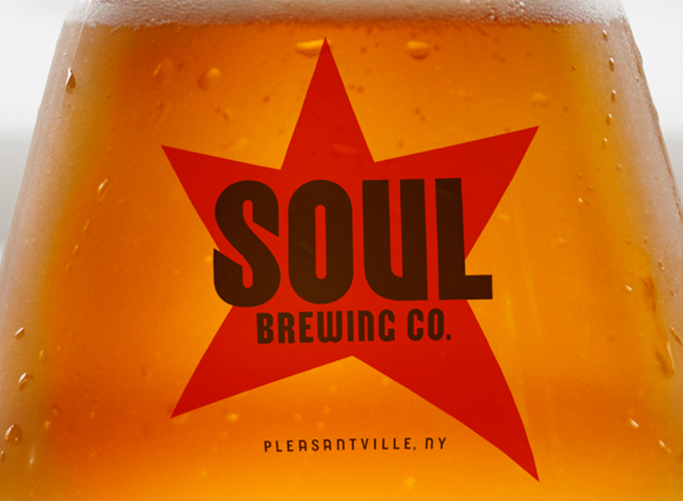 Soul Brewing Co. glass of beer with logo