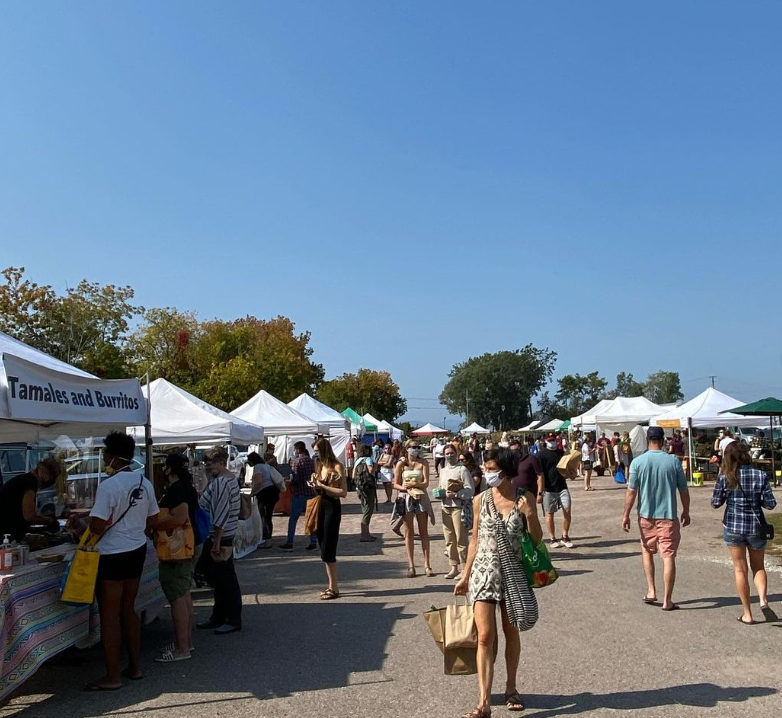 Vendors at a busy Burlington Farmers Market