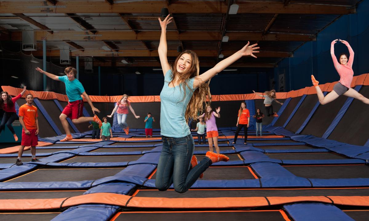 Kids and young adults jumping at SkyZone Trampoline Park