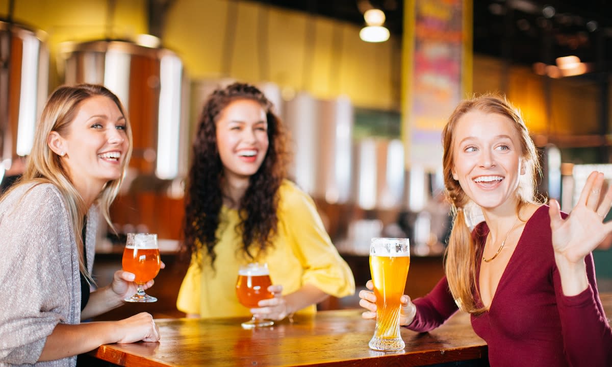 Girls drinking craft beer from Ever Grain Brewing