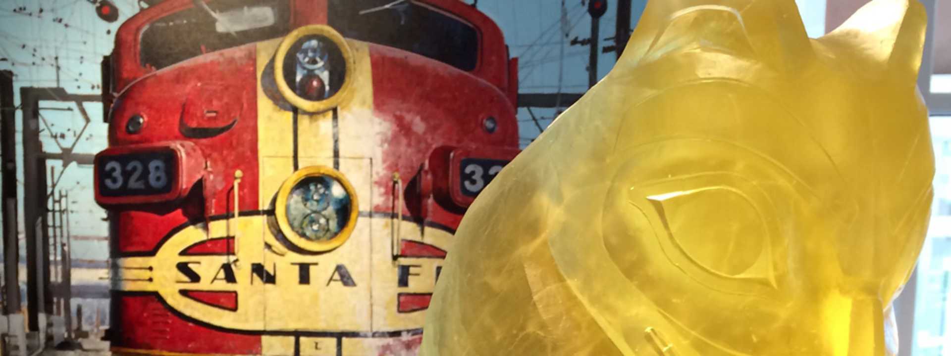 Fine Art in New Mexico, a painting of a AT&SF train and glass sculpture