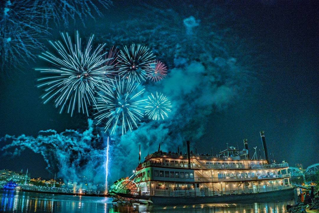 The image is of the BB Riverboat at night with fireworks in the background.