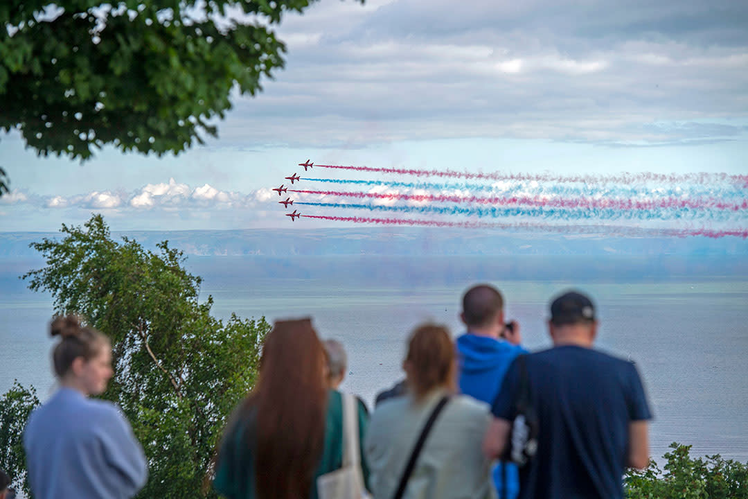 Red Arrows flying over Swansea Bay