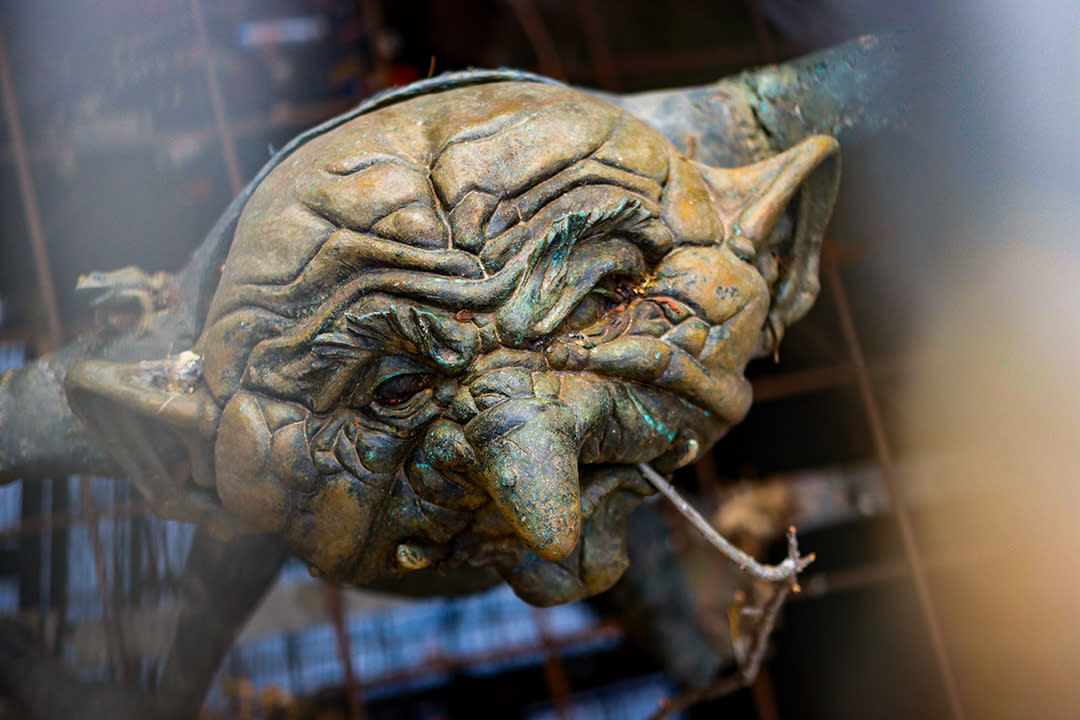 A photo of the Troll sculpture near the Keeper of the Plains