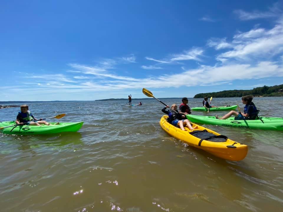 kayakers on a large lake