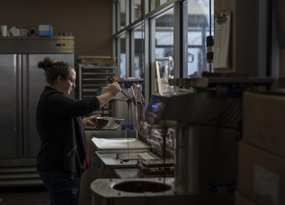 woman making handcrafted chocolate