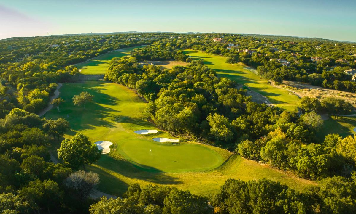 An aerial image of the golf course at Omni Barton Creek.