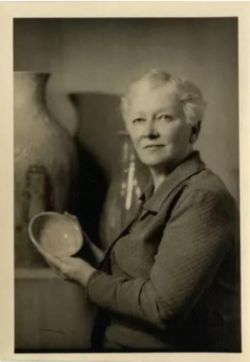 Mary Chase with pottery she made.