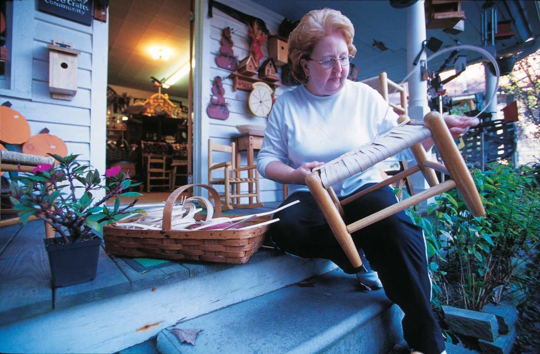 Woman Making Chair By Hand