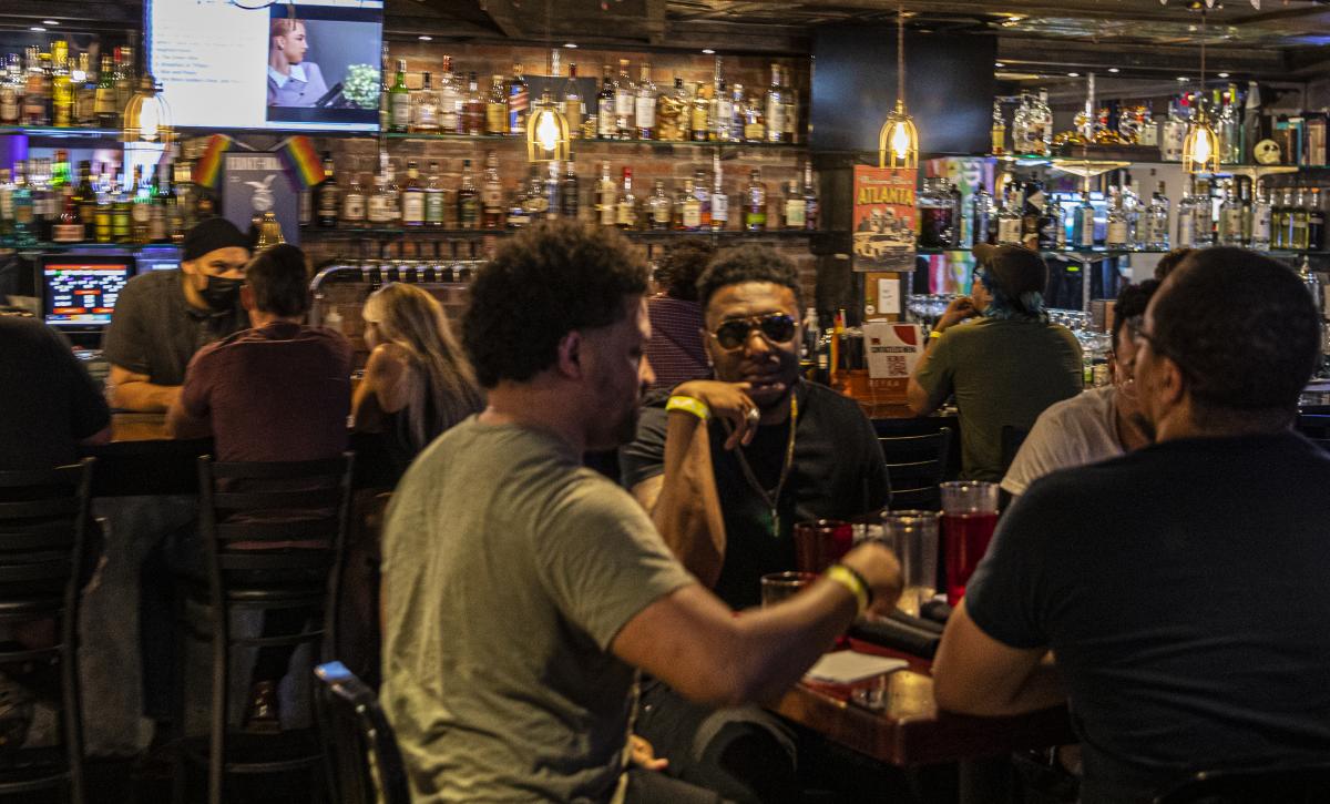 Customers enjoying a late night at Battle and Brew