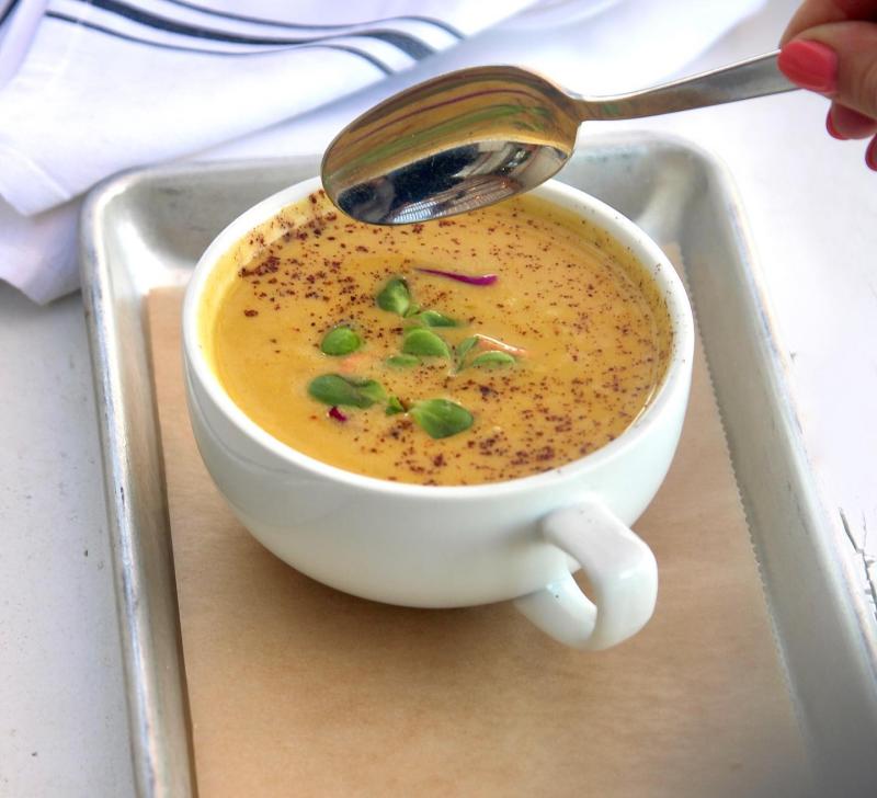 A bowl of Roasted Cauliflower and Bell Pepper soup from The Grove Cafe and Market