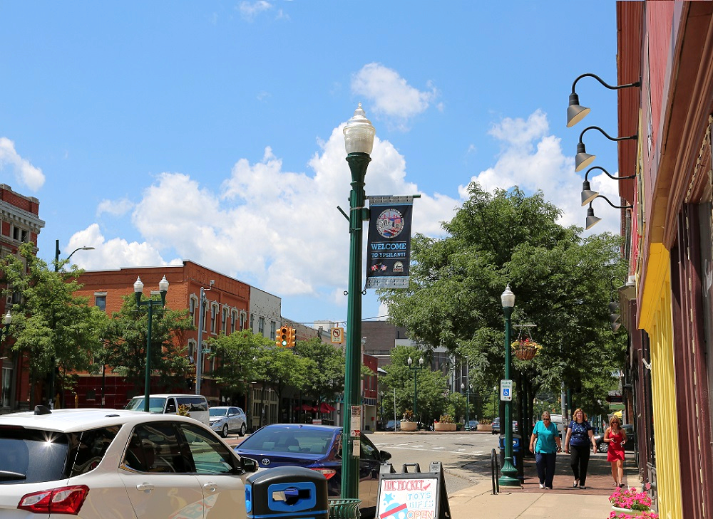 three people shopping downtown ypsilanti