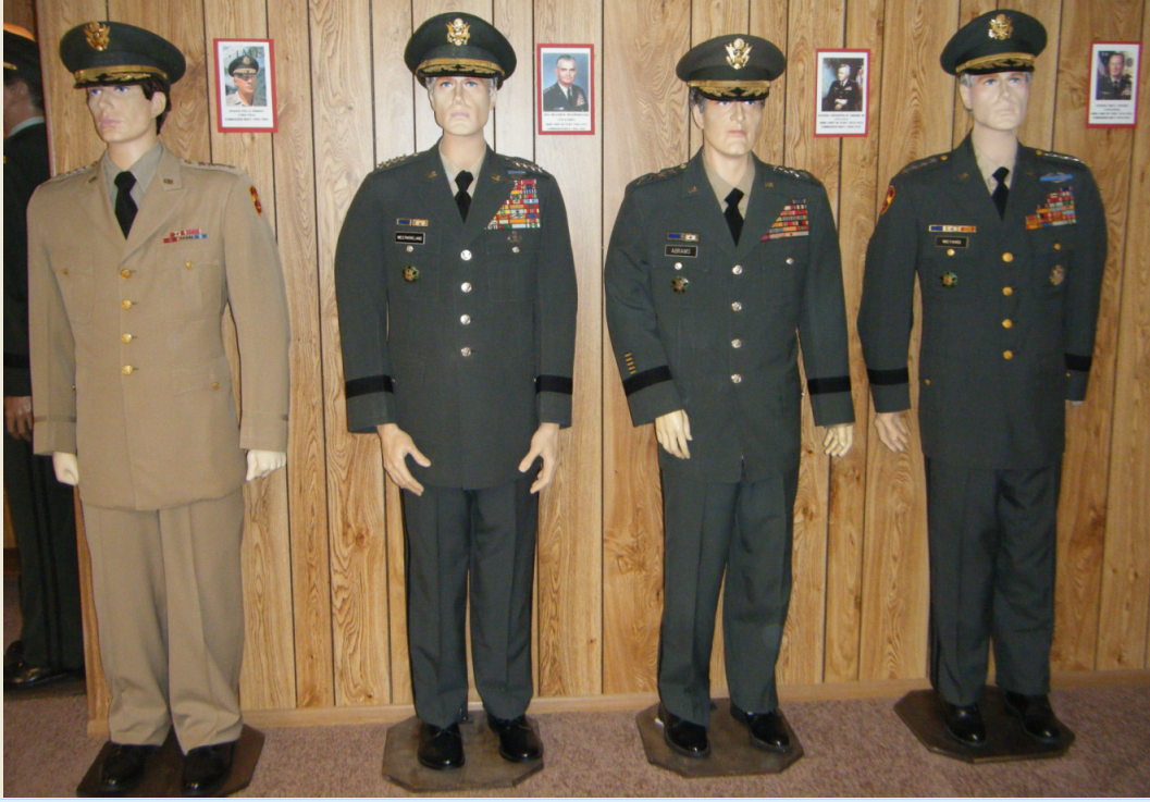 Display of military uniforms from different eras at the Military Memorial Museum, offering an educational family experience.