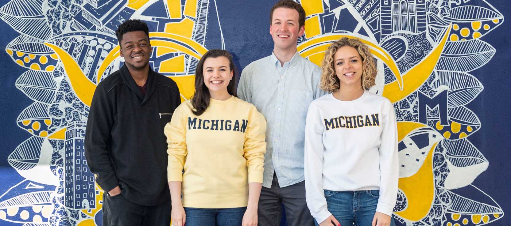 U-M students by Wings Mural