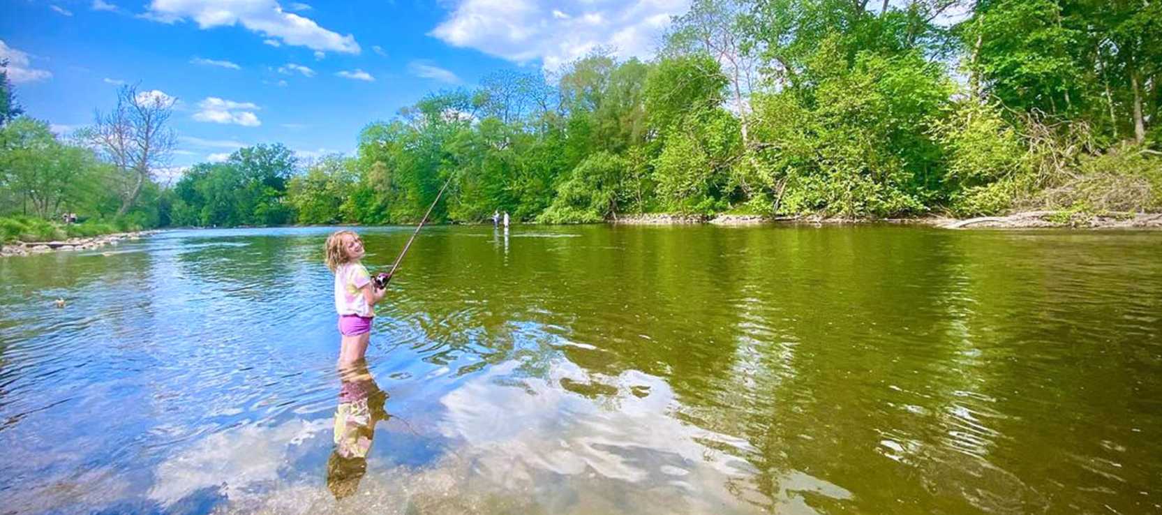 Girl fishing in Huron River
