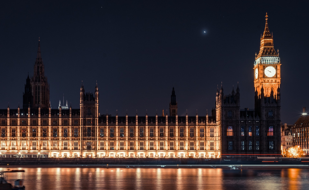 a view of Parliament's building lit up at night