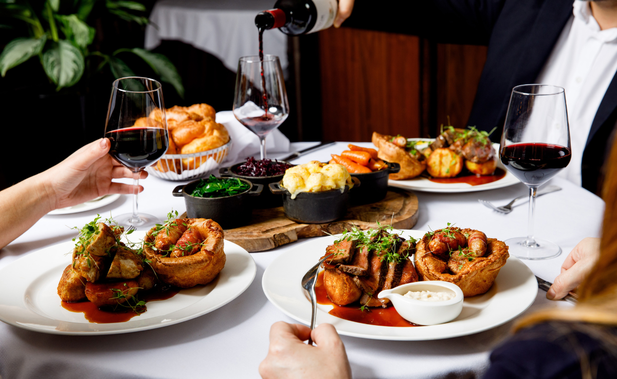 A group of business people enjoying a sunday roast.