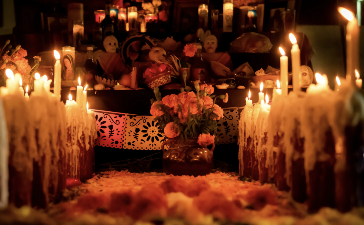 Altar decorated with marigolds and sugar skulls at Santa Ana Día de Los Muertos festival