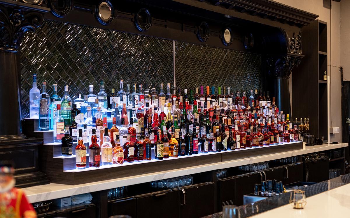 Interior of the bar and liquor shelves at Dana's bar on The Landing