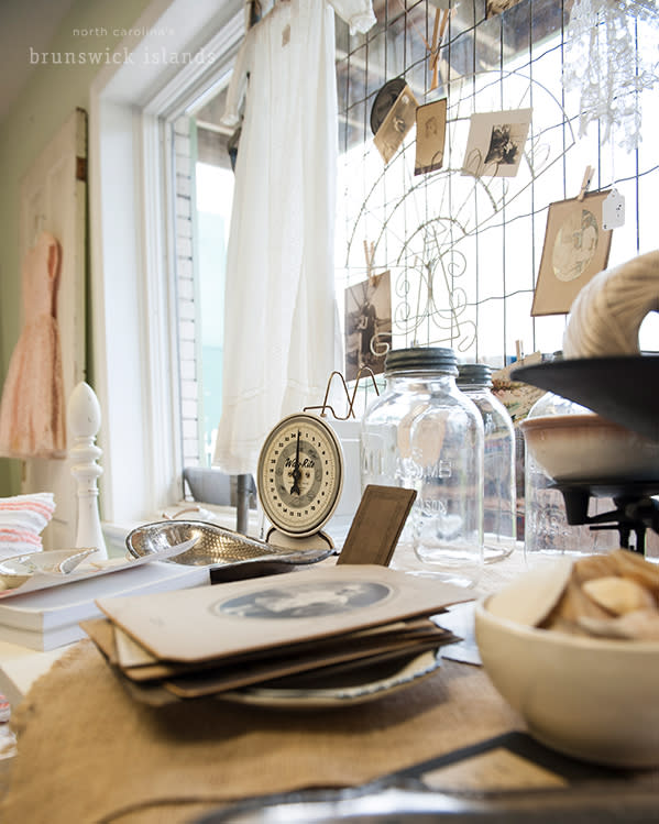 a table full of antiques for sale in shallotte, nc