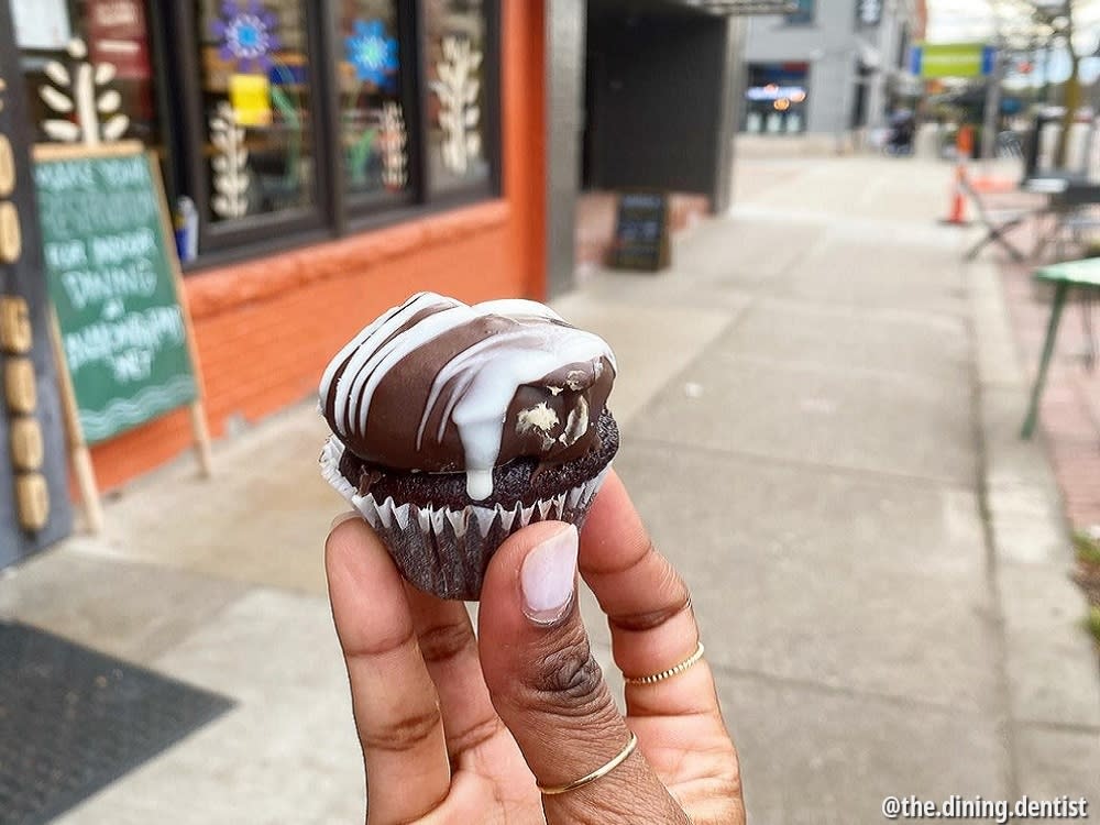 Bakehouse 46, person holding cupcake