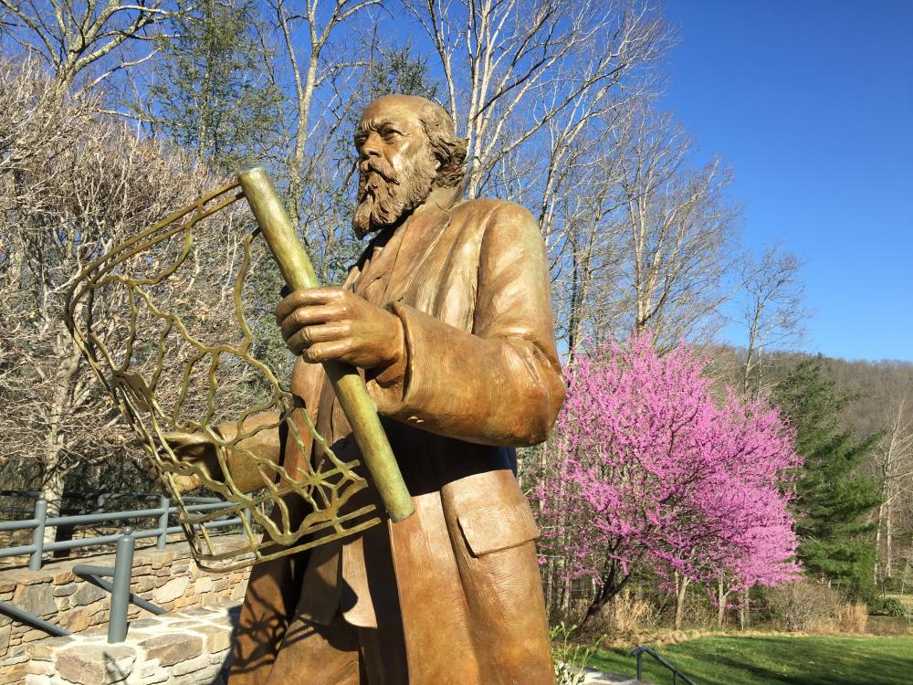 A statue of Olmstead lives at the NC Arboretum in Asheville
