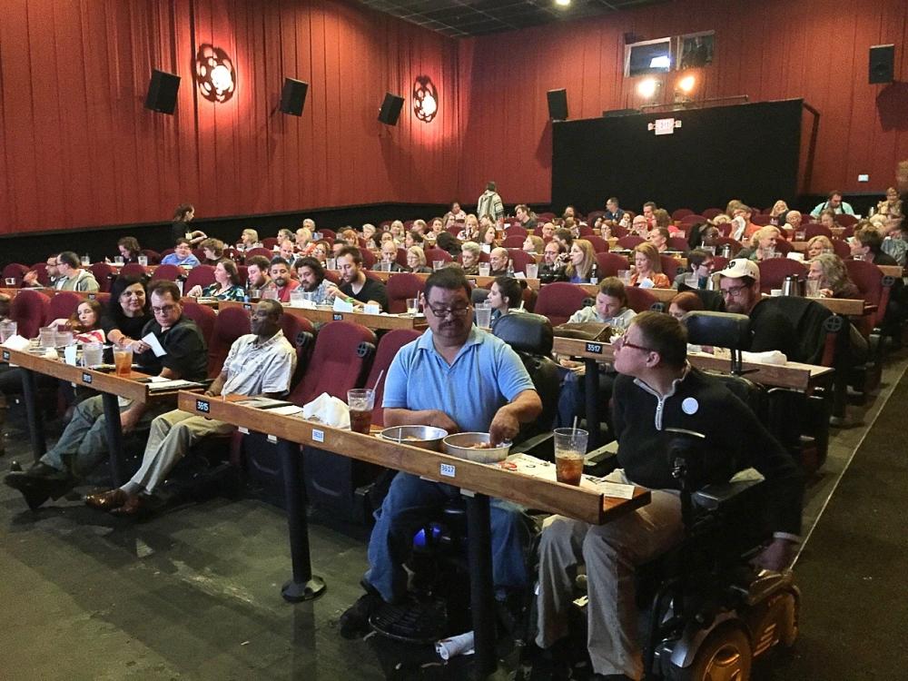 Festival goers at Alamo Drafthouse theater during Cinema Touching Disability Film Fest