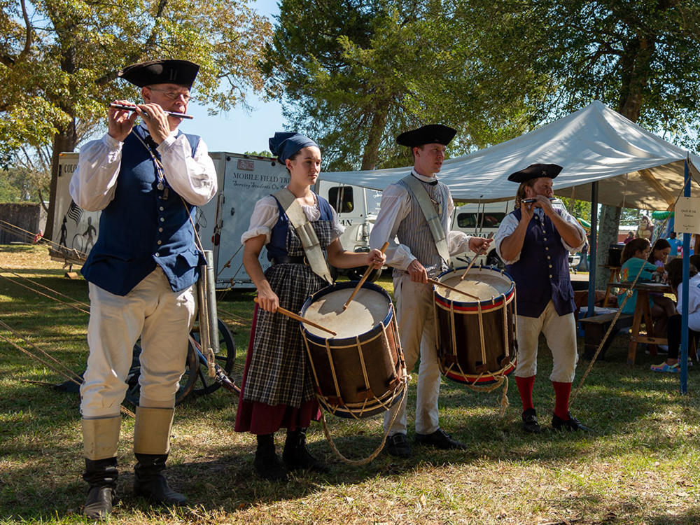 Camp Flintlock colonial band plays at the Four Oaks Acorn Festival.