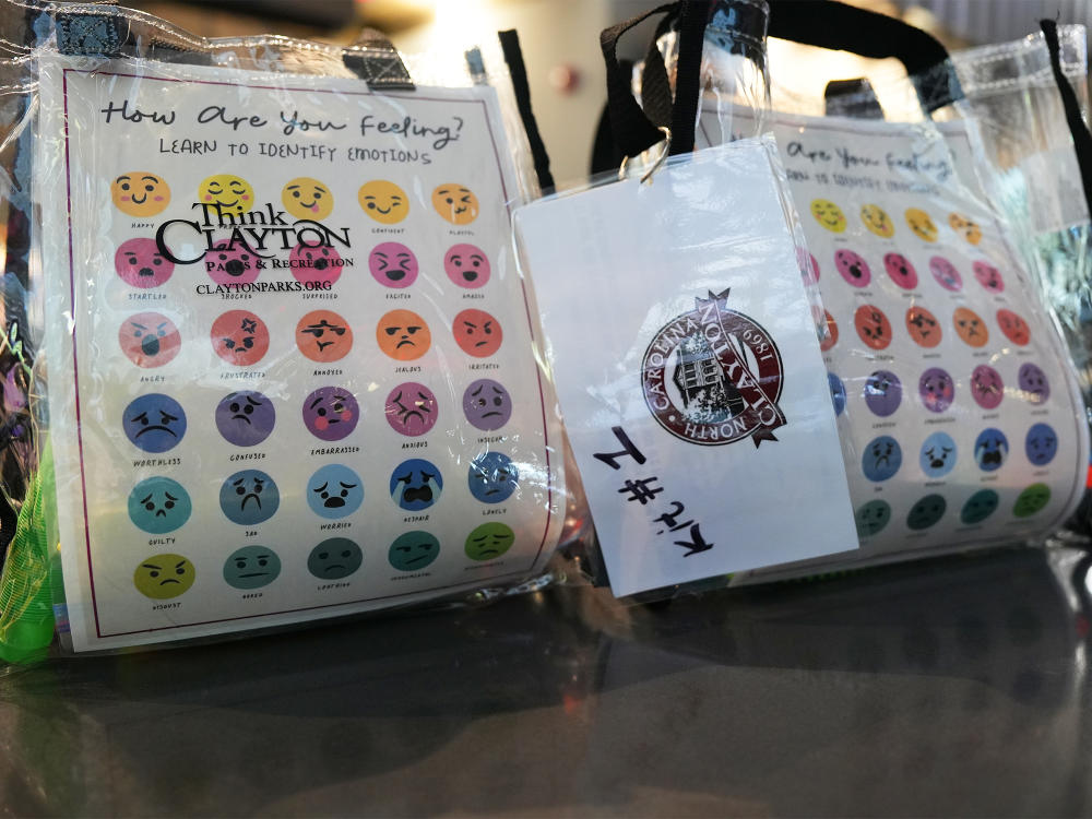 Clayton Community Center Sensory Kits with feelings chart on display.