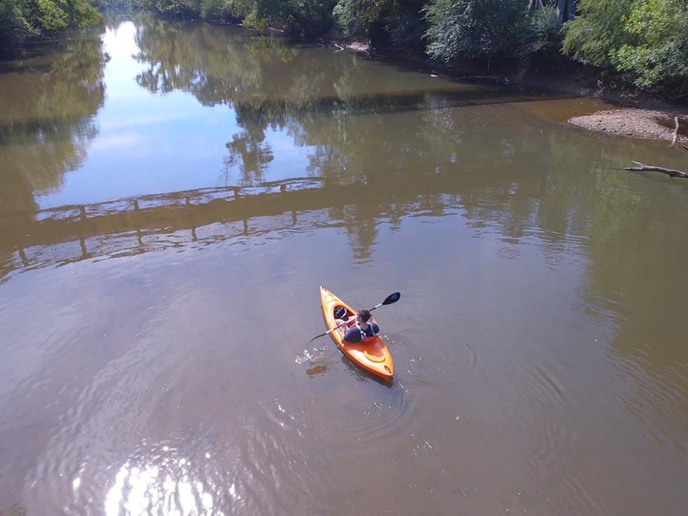 Clayton River Walk and a kayak in the Neuse River.